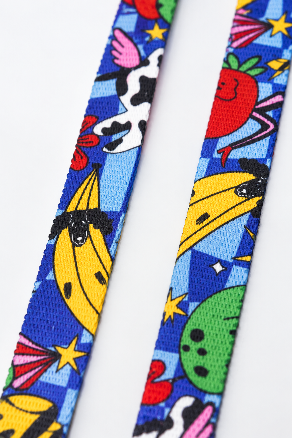 Close-up of the weave and Holy Cow print on the soft nylon harness straps