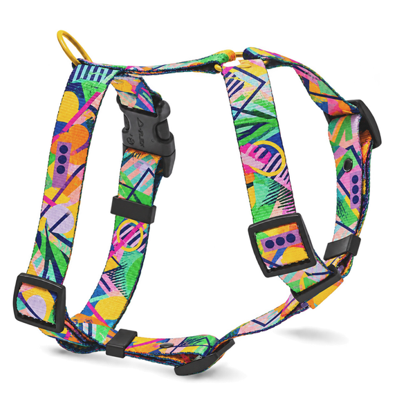 Kaleidogscope dog harness with bright multicoloured geometric print and black buckles
