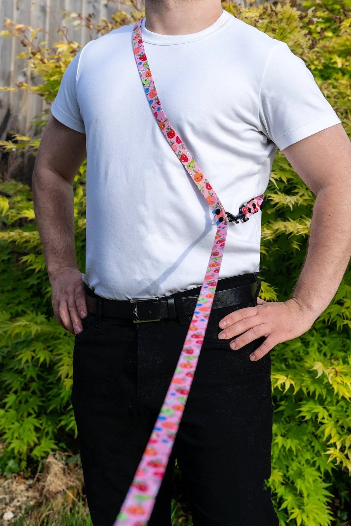 Person wearing a Sweet Tooth hands-free lead across their body on a walk