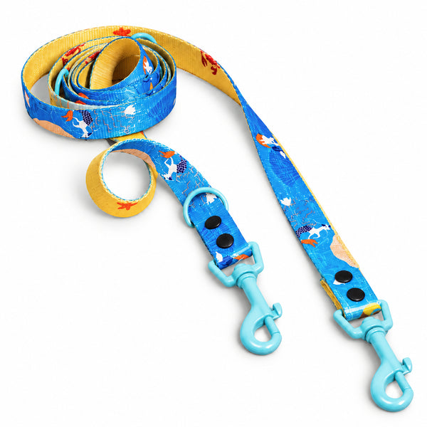 Beach Walk turquoise double-ended dog lead with two clips and seaside print