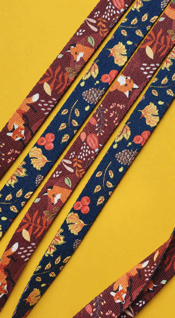 Close-up of the What The Fox fox print on dog harness webbing