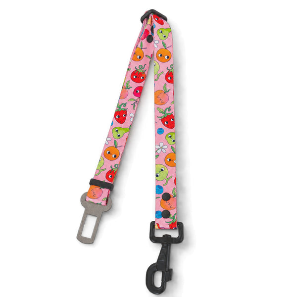 Sweet Tooth pink dog car seat belt with smiling fruit print, seat-belt tongue and black clip