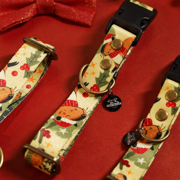 Capybara Christmas dog collar: cream Christmas print with capybaras in Santa hats and red berries