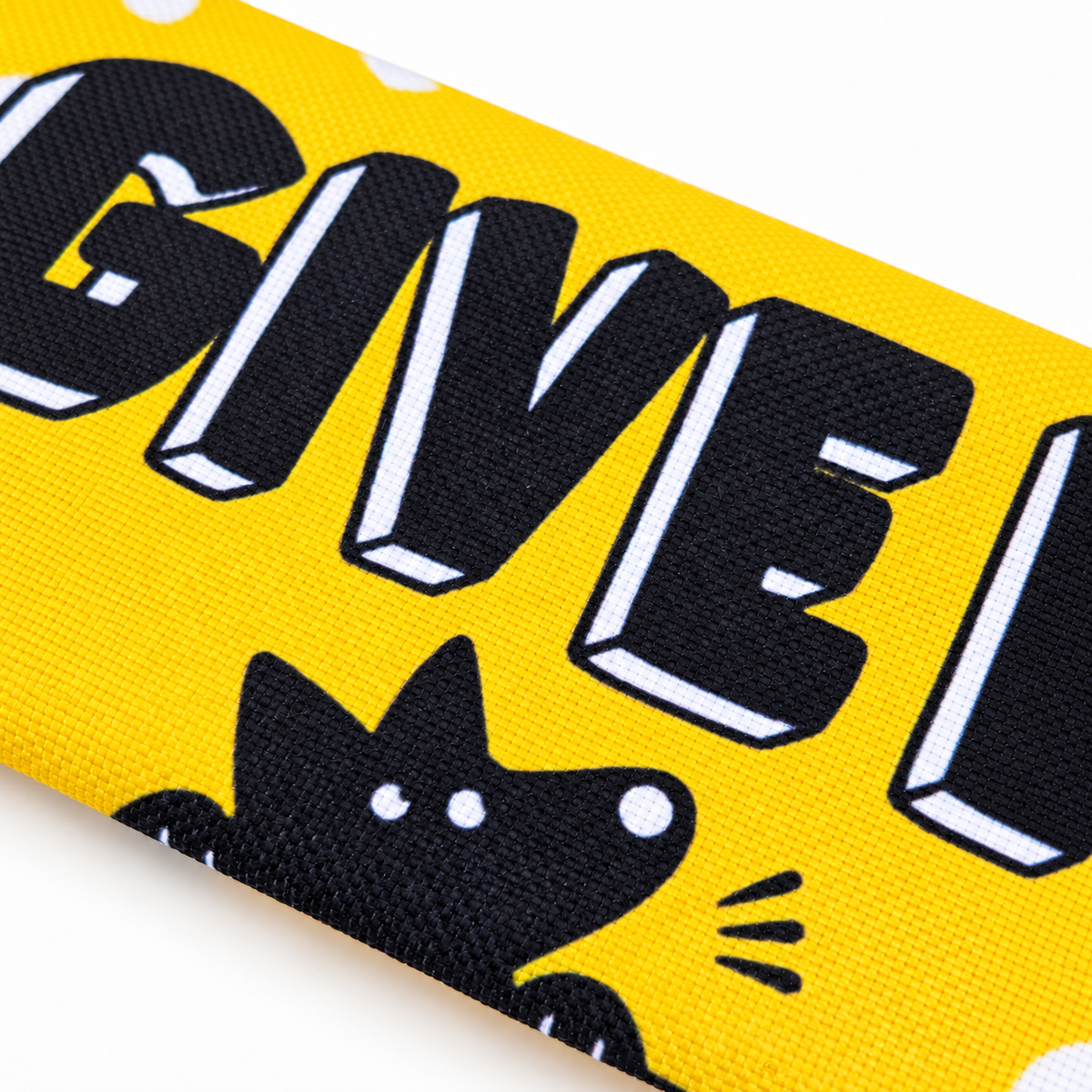Close-up of the yellow Give Me Space dog lead sleeve for nervous dogs.
