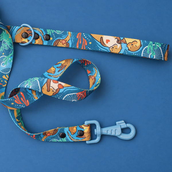 Turquoise Hello From The Otter Side dog lead with otter print and light blue clip
