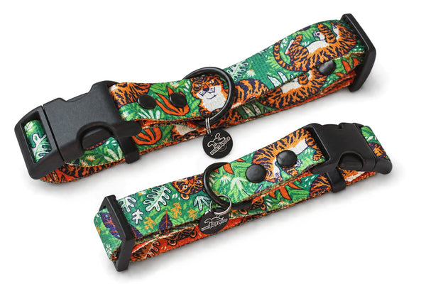 Two Let's Get Wild green tiger-print dog collars with black buckles