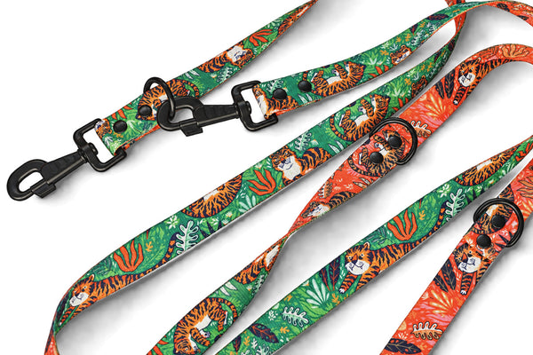 Let's Get Wild green and orange tiger-print double-ended dog leads with black clips