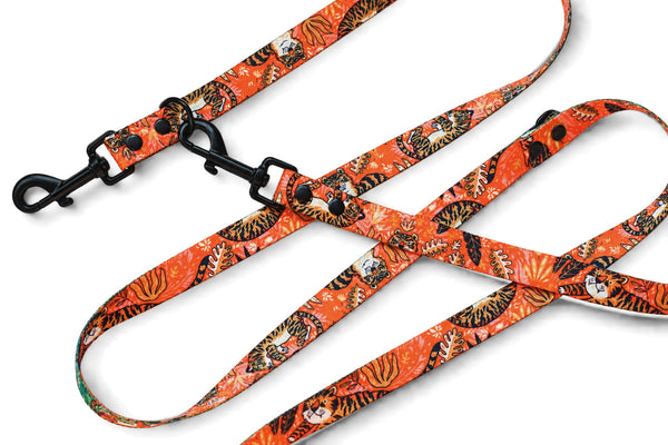 Let's Get Wilder orange tiger-print double-ended dog lead with two black clips