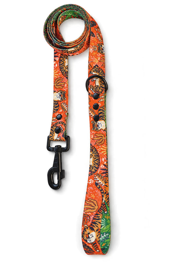 Let's Get Wilder orange tiger-print dog lead with black clip and loop handle